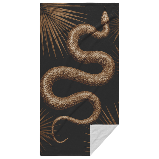summerween gothic beach towel with gold snake and palm leaves on black background