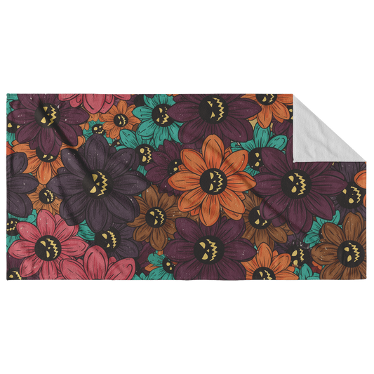 Jack-o-lantern_Daisies_Beach_Towel_Main_Fold_Horizontal_Mockup.png